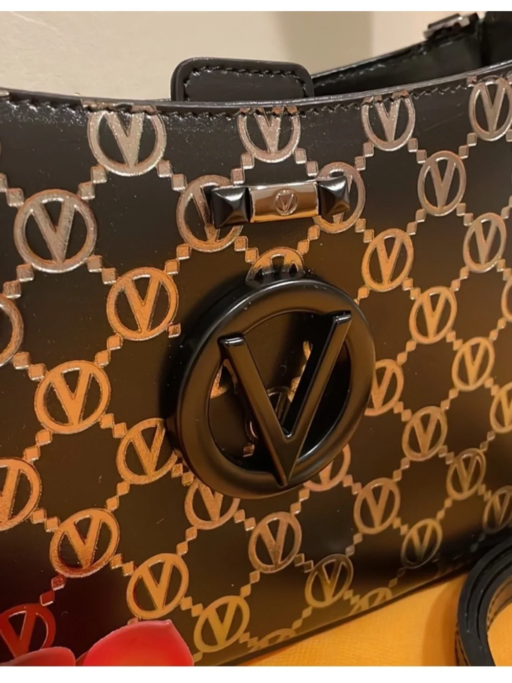 Valentino hand shoulder
